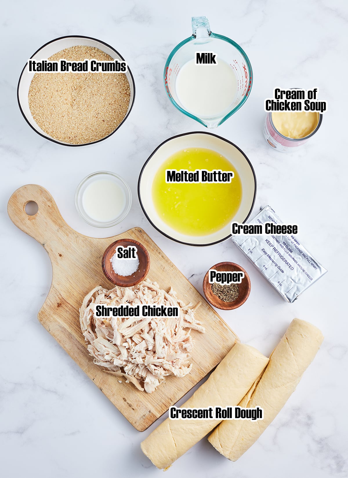 The ingredients needed to make chicken crescent roll ups with labels on them.