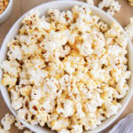 An above view of a bowl of sweet and salty kettle popcorn.