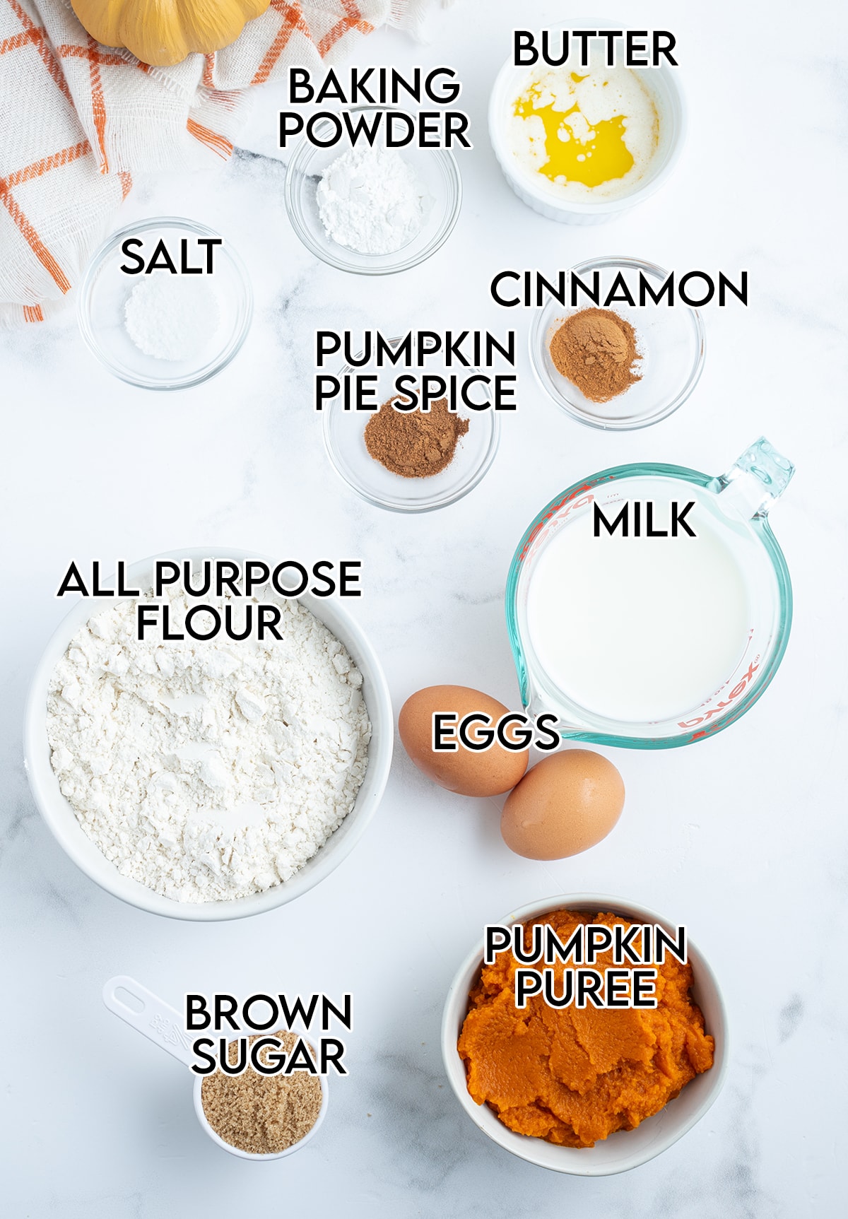 The ingredients needed to make pumpkin waffles.