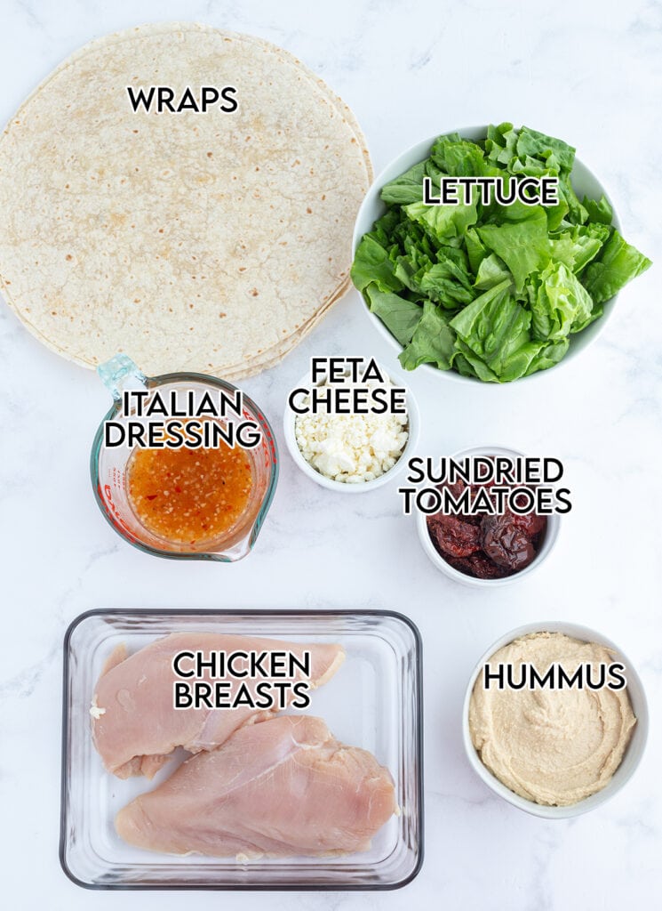 An overhead photo of the ingredients needed to make Mediterranean chicken wraps.