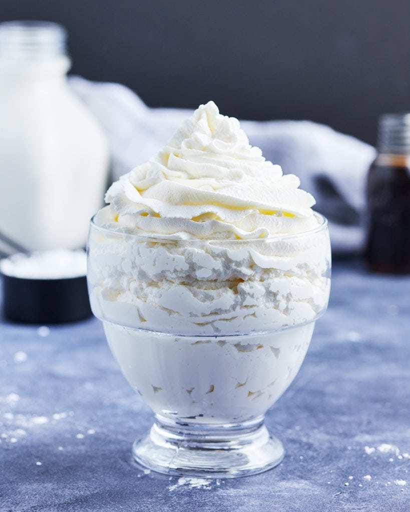 A bowl of piped whipped cream.