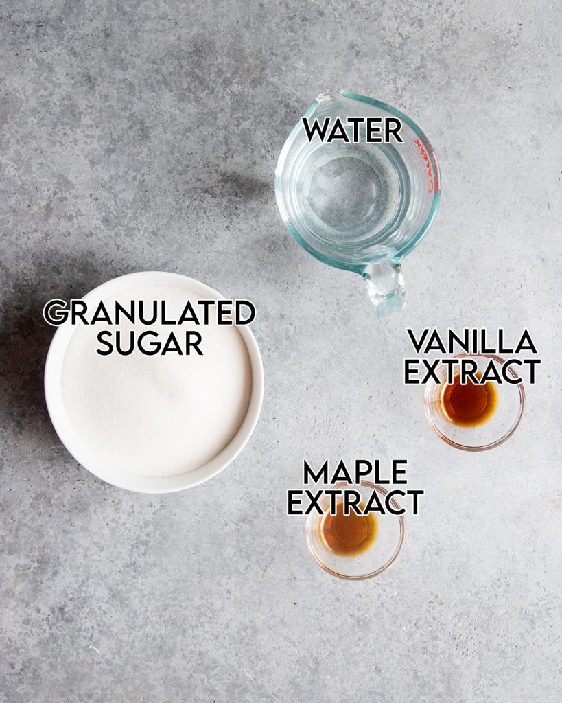 An overhead photo of the ingredients needed to make homemade maple flavored syrup.
