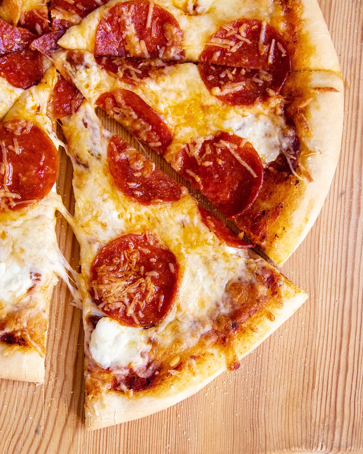 A piece of pepperoni pizza.