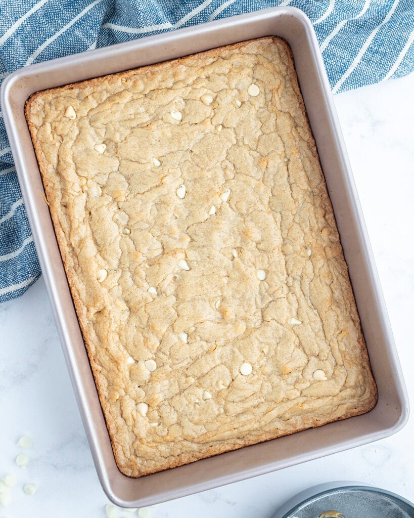 White Chocolate Chip Cookie Bars in a baking pan.