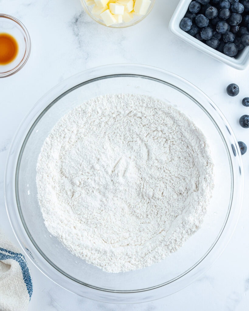 A bowl of flour and baking powder whisked together. 