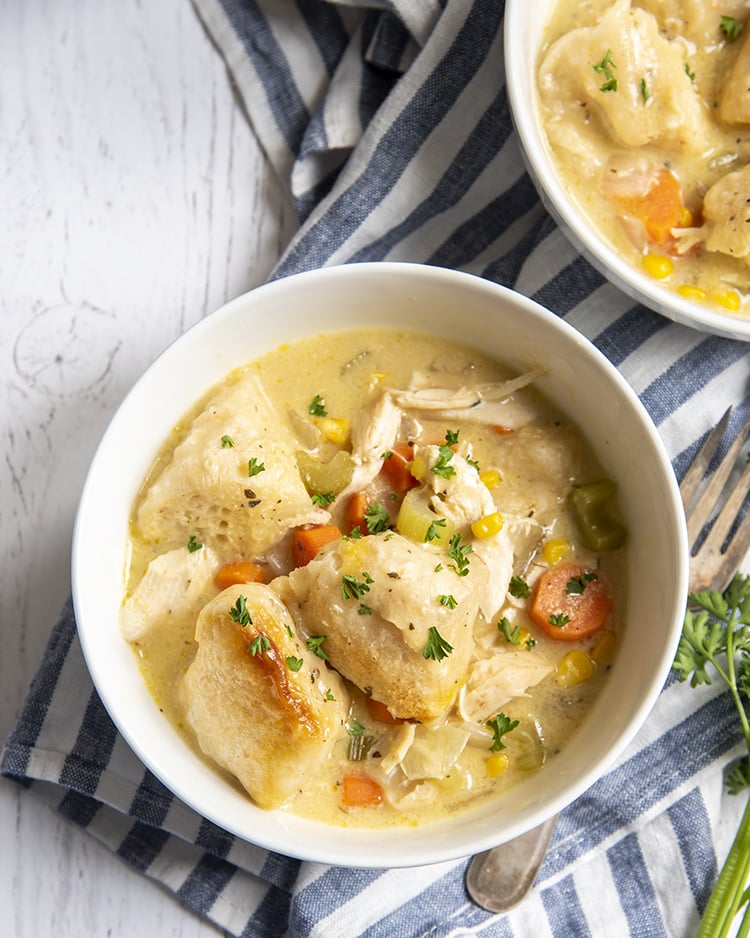 A bowl of chicken and dumplings.