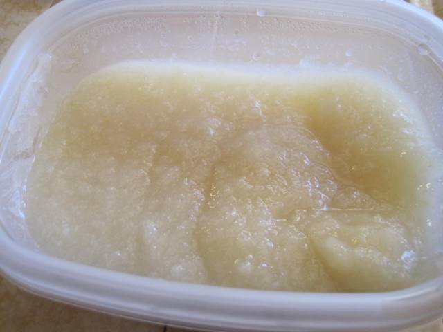 Close up view of pearsauce in a white bowl.