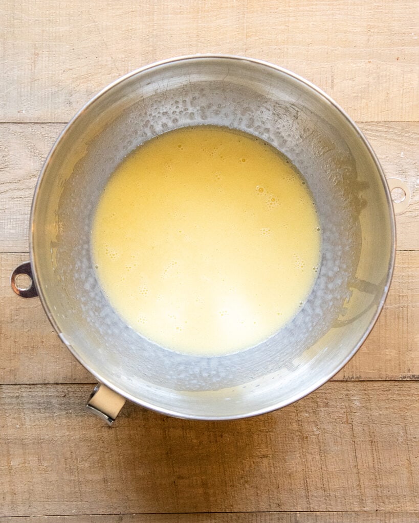 A bowl of eggs mixed with buttermilk. 