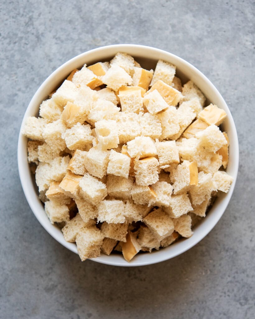 A bowl of cubed bread pieces. 