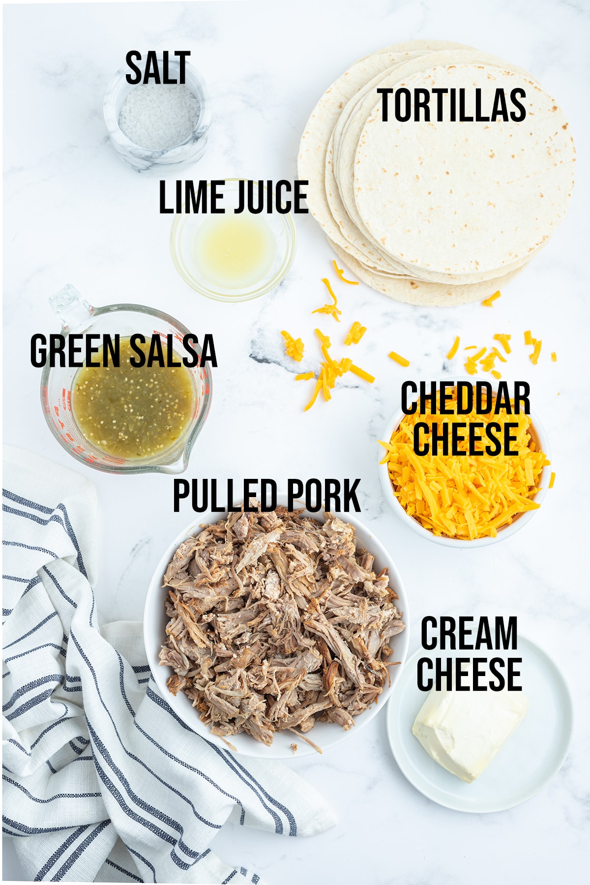 An overhead photo of the ingredients needed to make creamy pulled pork taquitos.