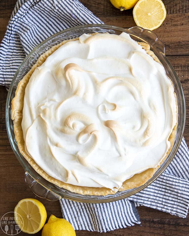 A lemon meringue pie topped with a thick layer of meringue