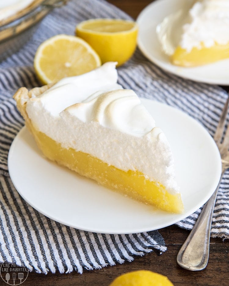 A piece of lemon meringue pie on a plate.