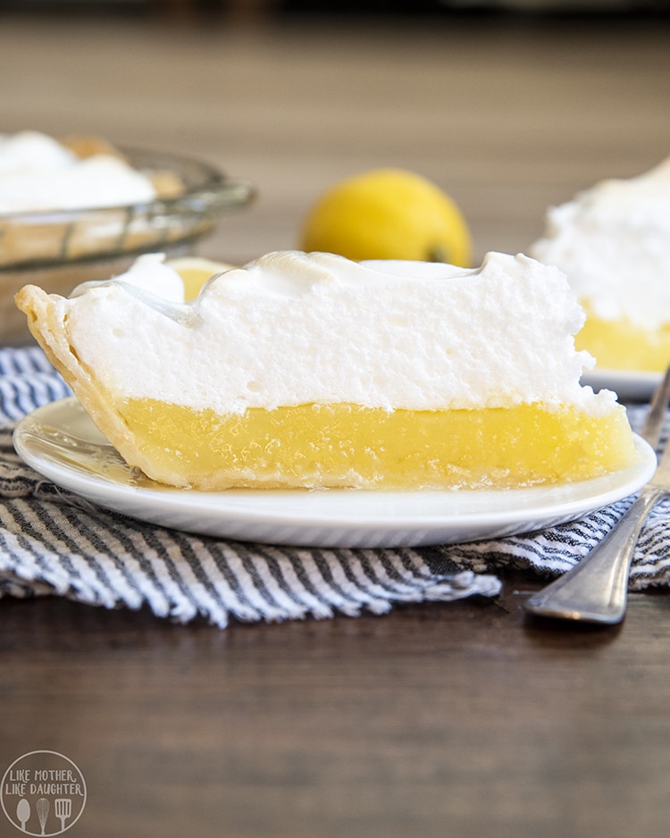 A perfect slice of lemon meringue pie with the best thick meringue topping