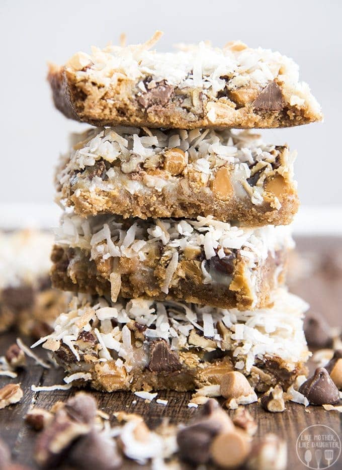 Side view of stacked chocolate coconut bars.