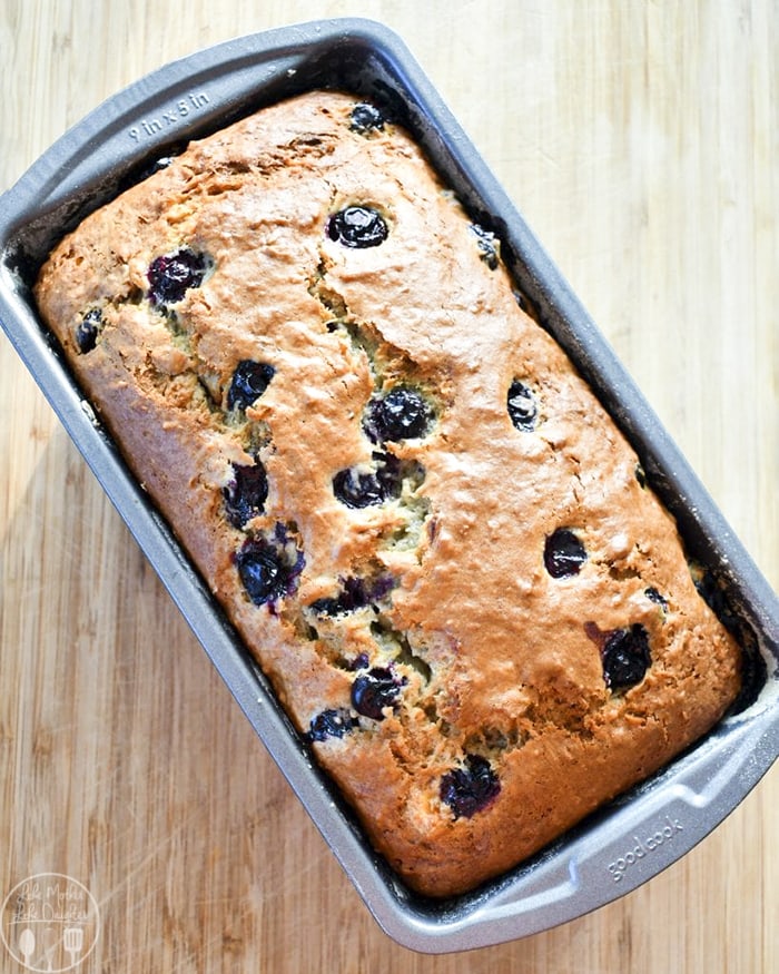A loaf pan of blueberry banana bread. 