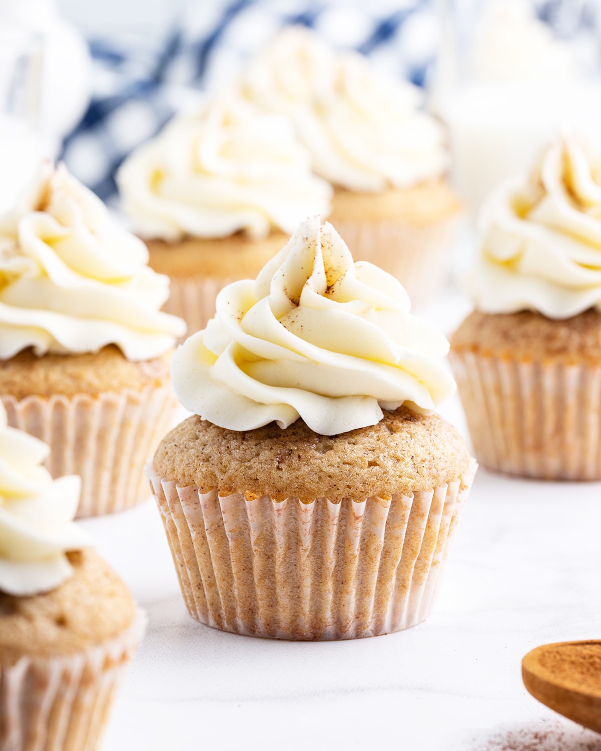 French toast cupcakes topped with maple buttercream frosting.