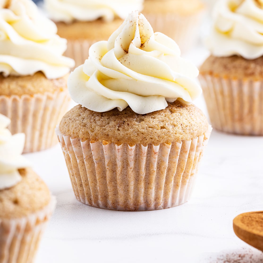 A square photo of french toast cupcakes.