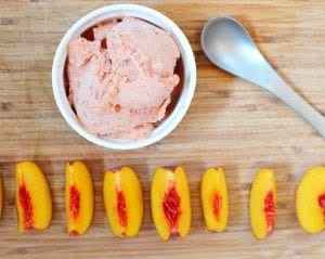 Top view of peach sorbet in a white plate.