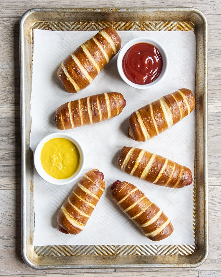Pretzel Hot Dogs on a tray shot from above