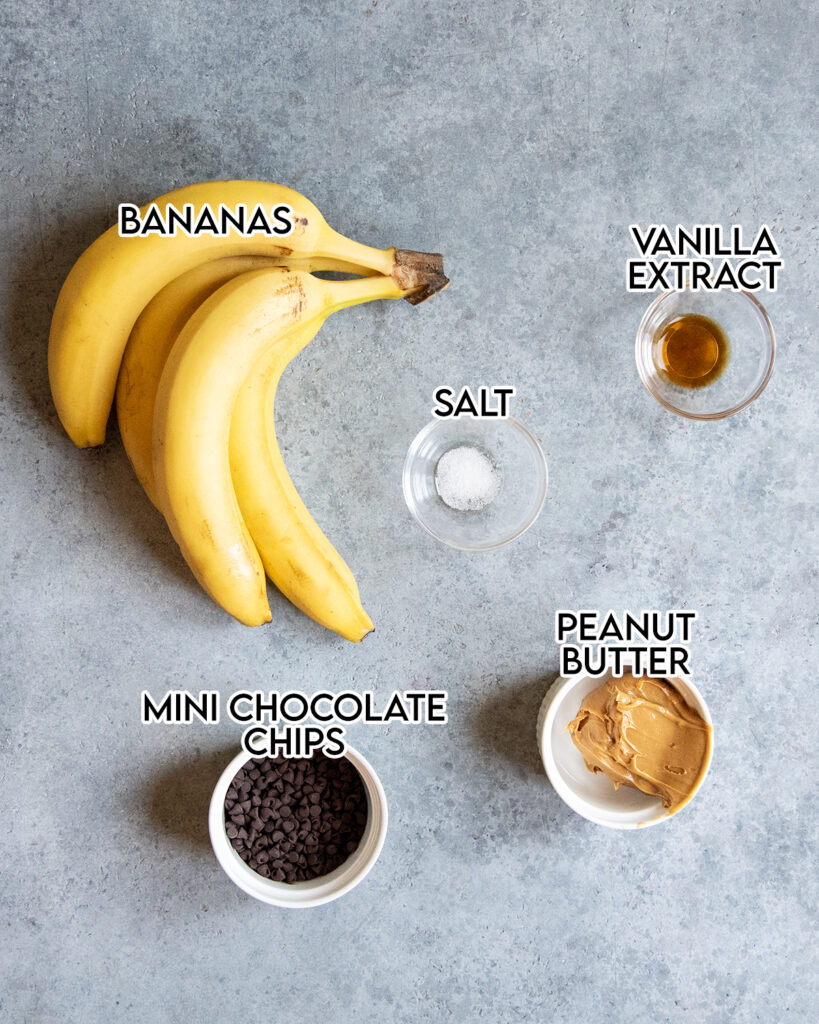 An overhead view of the ingredients needed to make healthy banana ice cream with peanut butter.