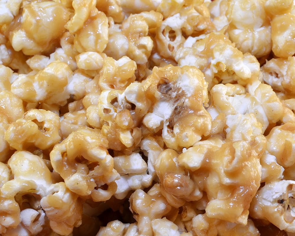 Close up view of peanut butter popcorn in a bowl.