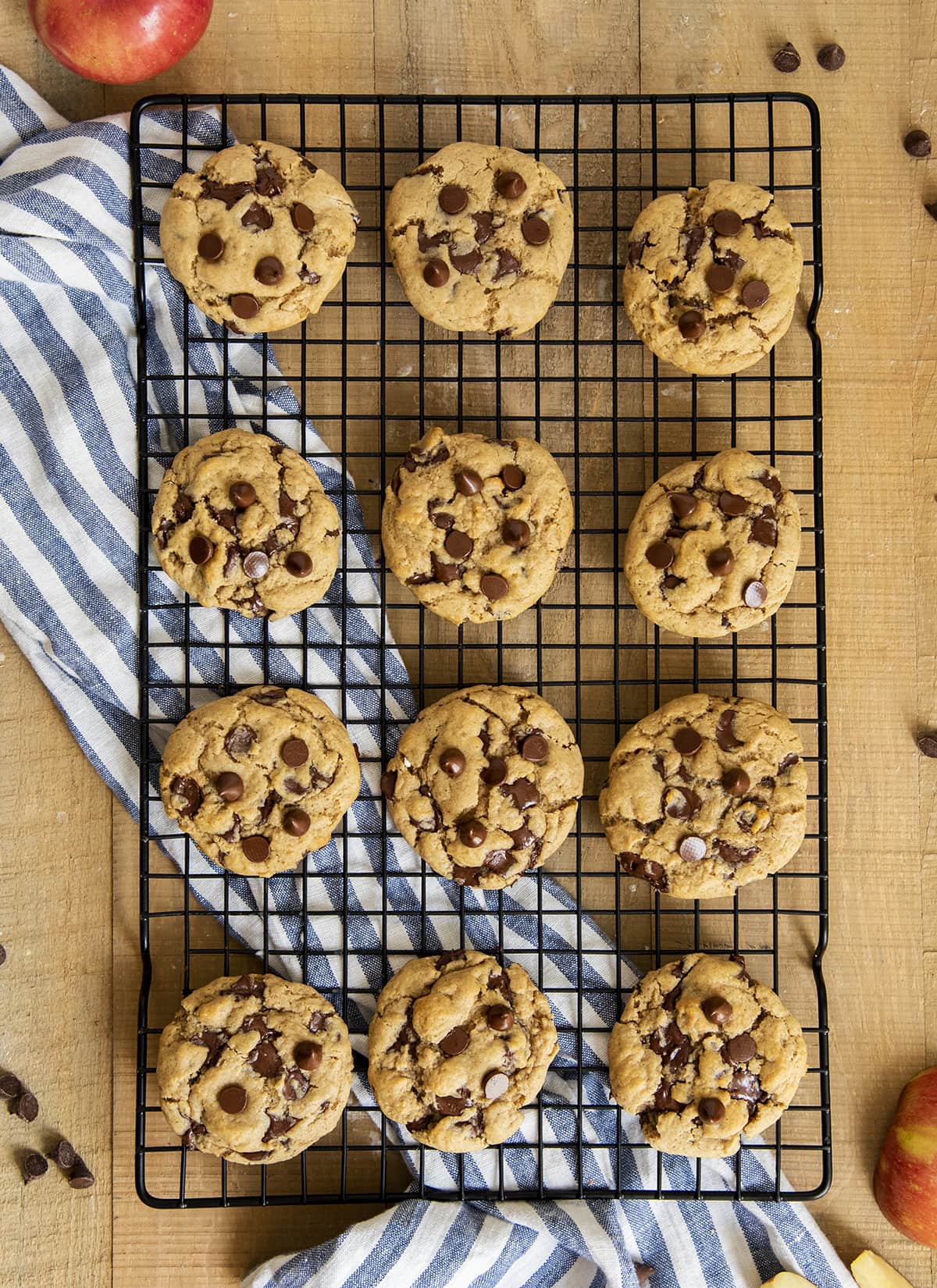 An overhead photo of applesauce chocolate chip cookies on a cooling rack. 