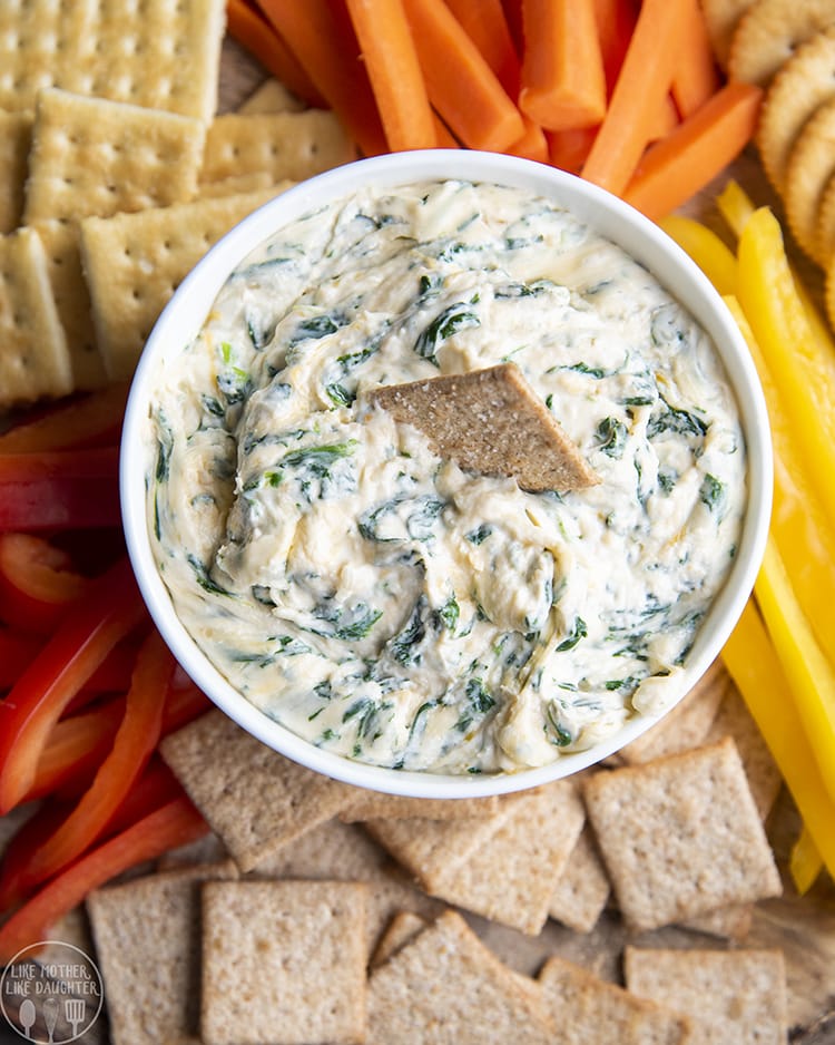 Spinach dip is perfect served with crackers for a holiday party