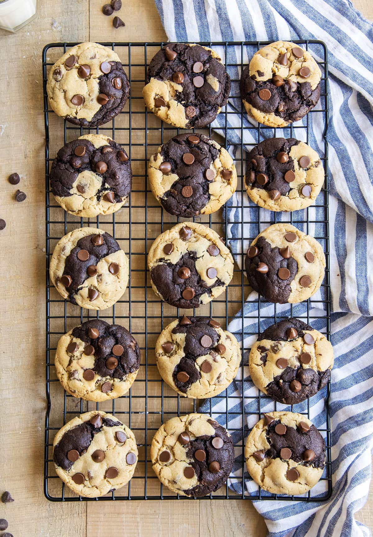 A cooling rack loaded with chocolate peanut butter marbled cookies.