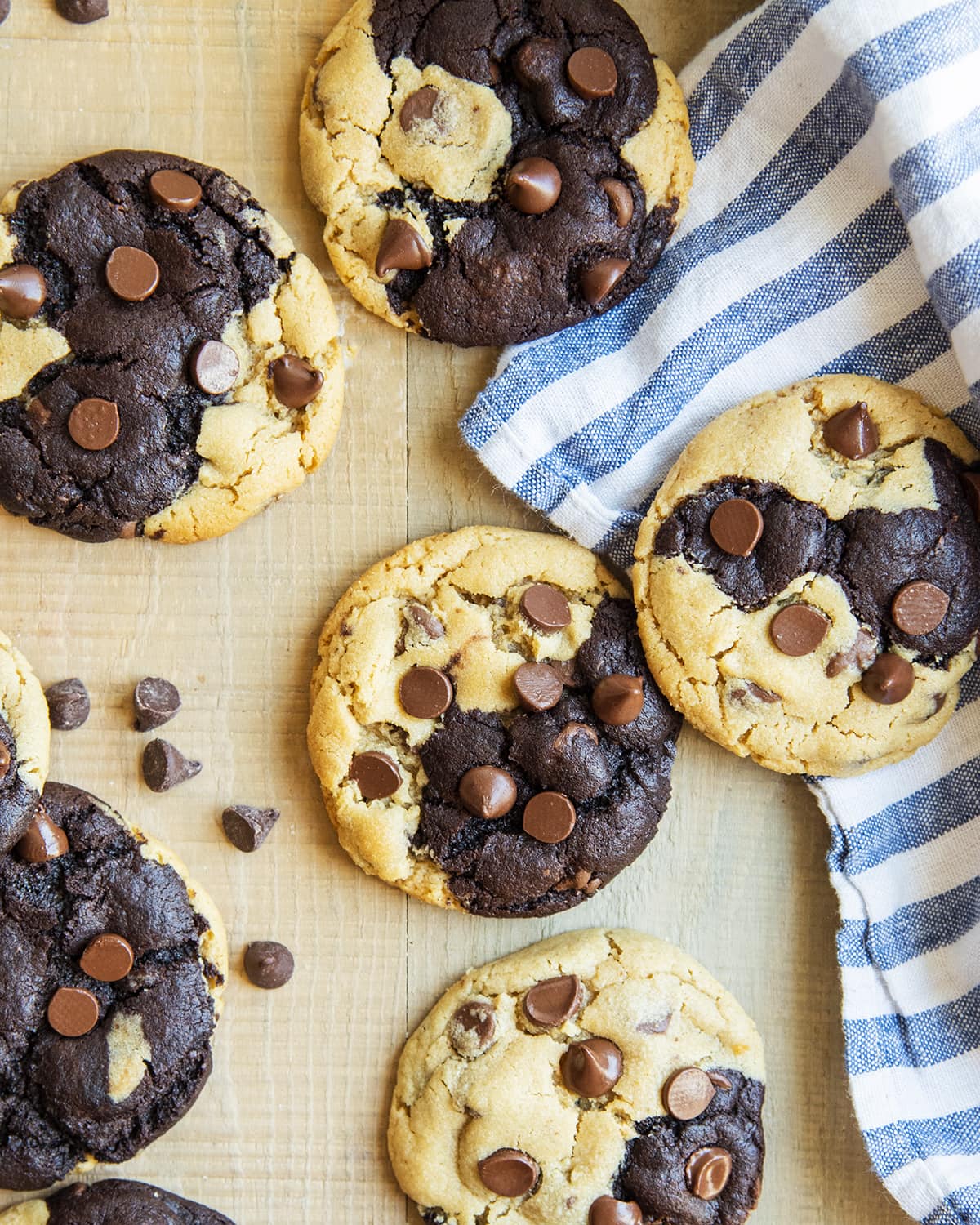 An overhead photo of chocolate and peanut butter marbled cookies on a wooden table.