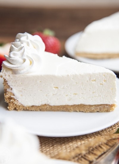A piece of no bake cheesecake with a graham cracker crust.