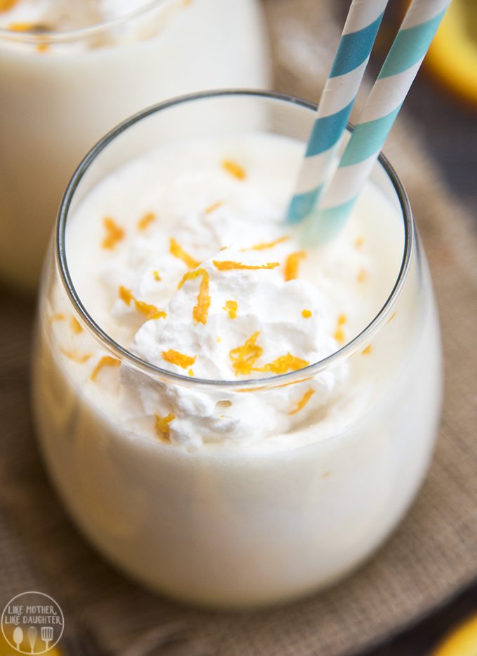 Angled view of orange julius in a glass.