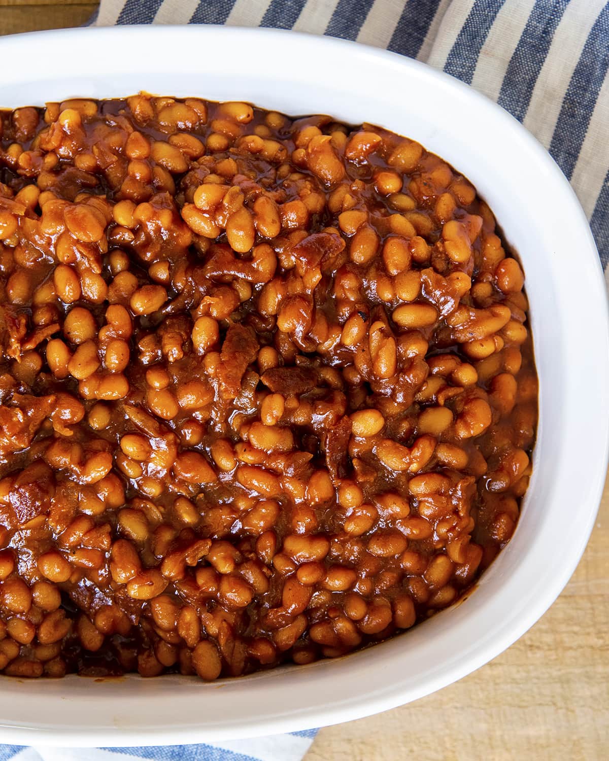 An overhead photo of a baking dish full of baked beans.