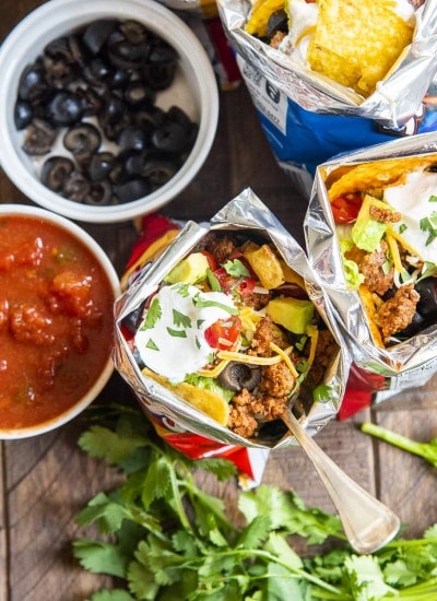 An overhead shot of walking tacos showing the taco toppings inside.