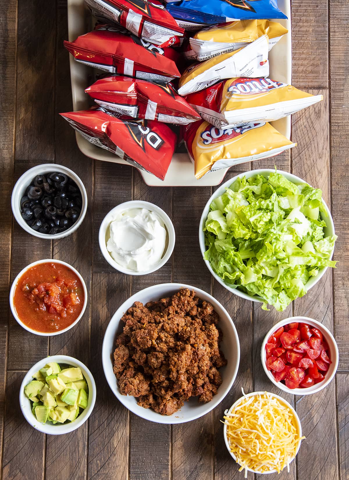 An overhead shot of the ingredients needed to make walking tacos.