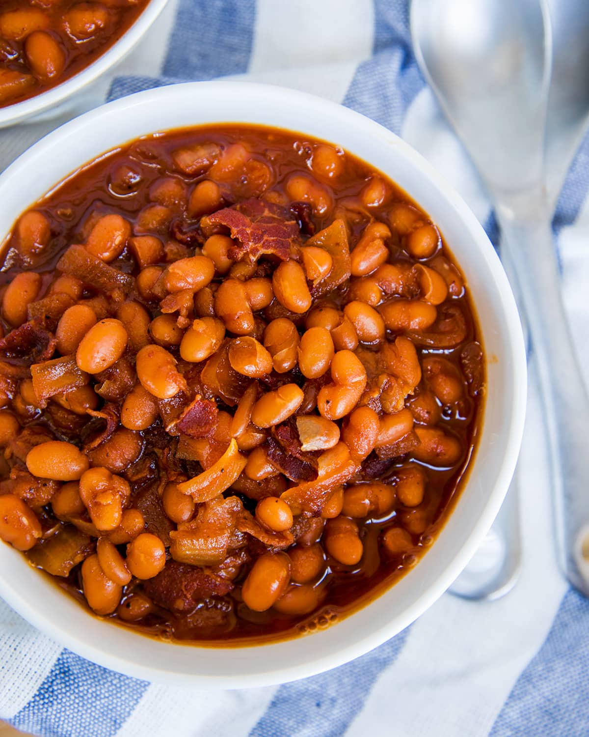 Am overhead photo of a bowl of baked beans.