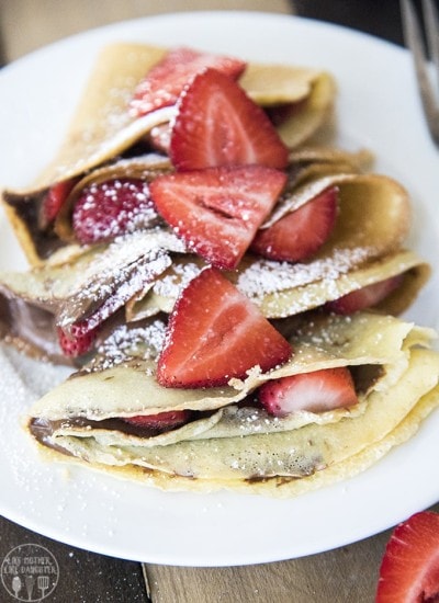 Front view of crepes with strawberries.