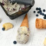 Smooth and creamy homemade ice cream with real bananas and blueberries for a delicious banana blueberry swirled ice cream dessert.