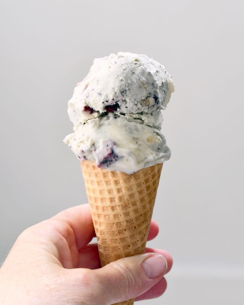 Smooth and creamy homemade ice cream with real bananas and blueberries for a delicious banana blueberry swirled ice cream dessert.