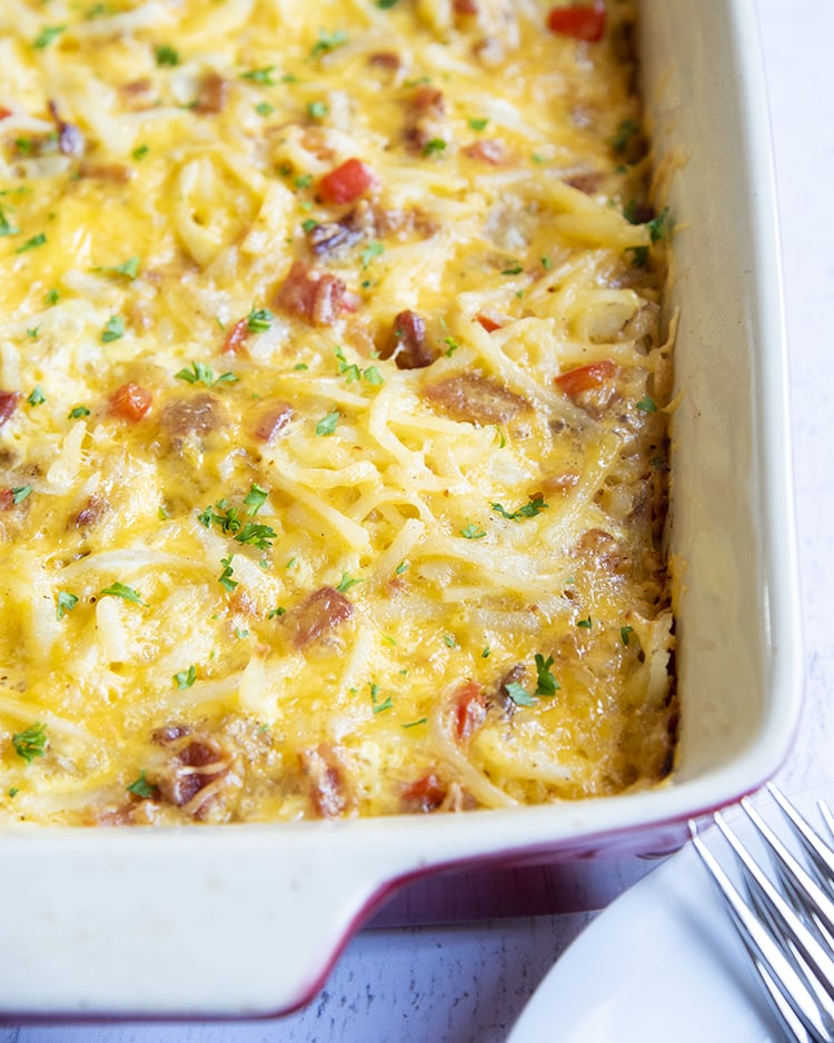 A close up of breakfast casserole in the baking pan.