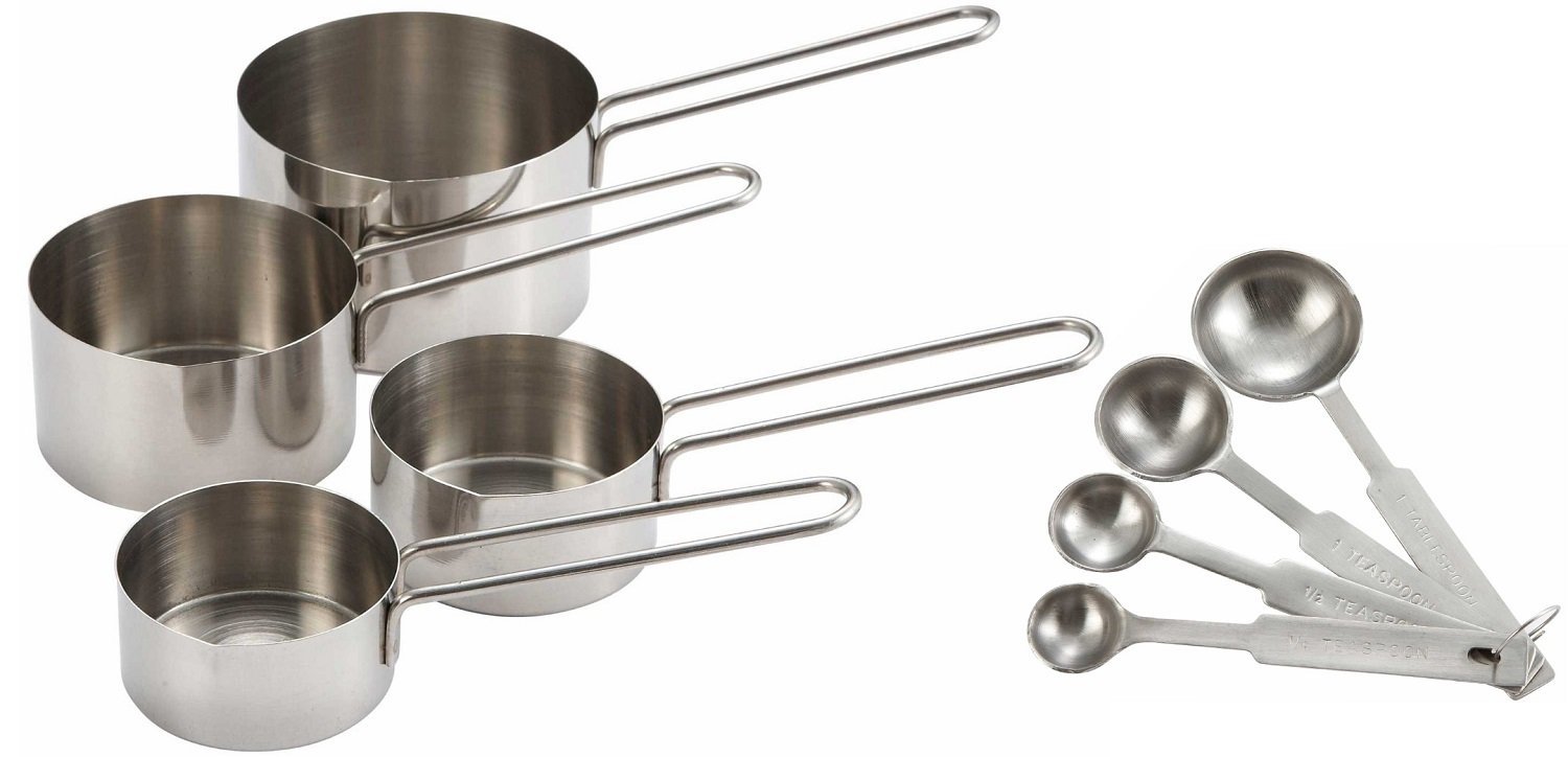 A variety of metal measuring cups and measuring spoons.