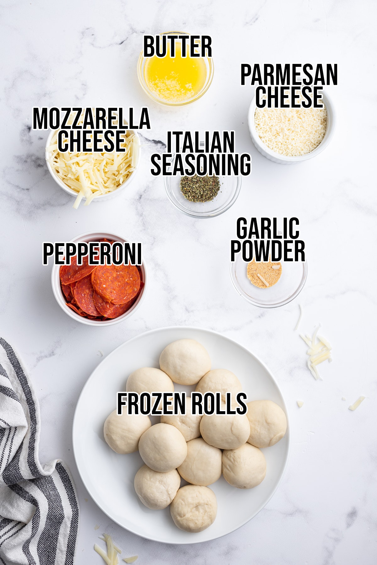An overhead photo of the ingredients needed to make stuffed pizza rolls.