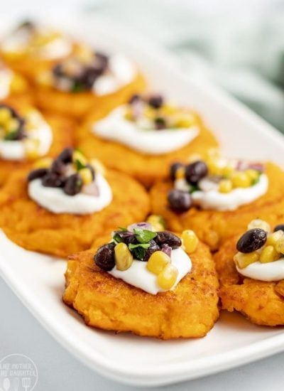 Sweet potato patties topped with sour cream and a corn and black bean salsa.