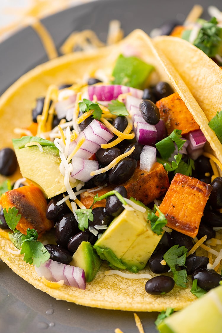 A close up shot of a sweet potato and black bean taco
