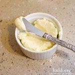 A ramekin filled with homemade butter.