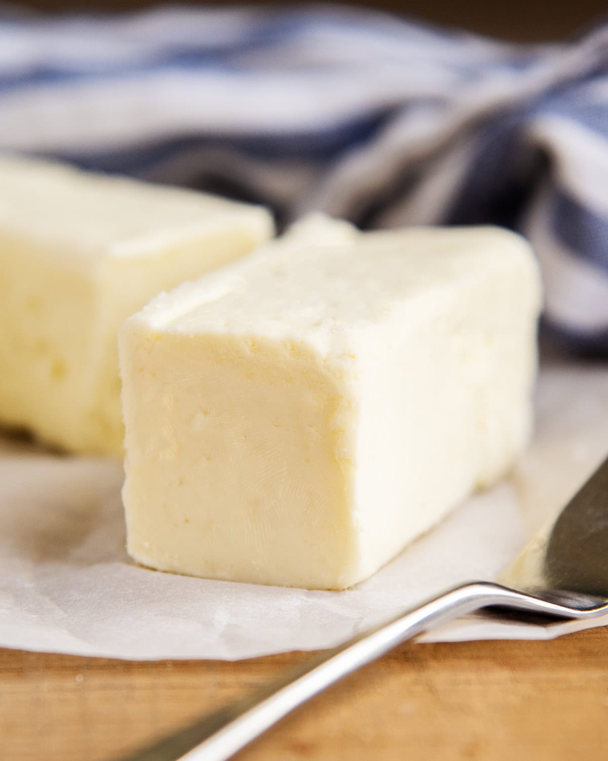 A front view of a stick of butter.