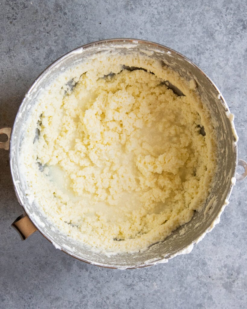 A bowl of butter that looks curdled.