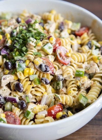 Close up of southwest pasta with pasta, chicken, vegetables and a chipotle ranch dressing