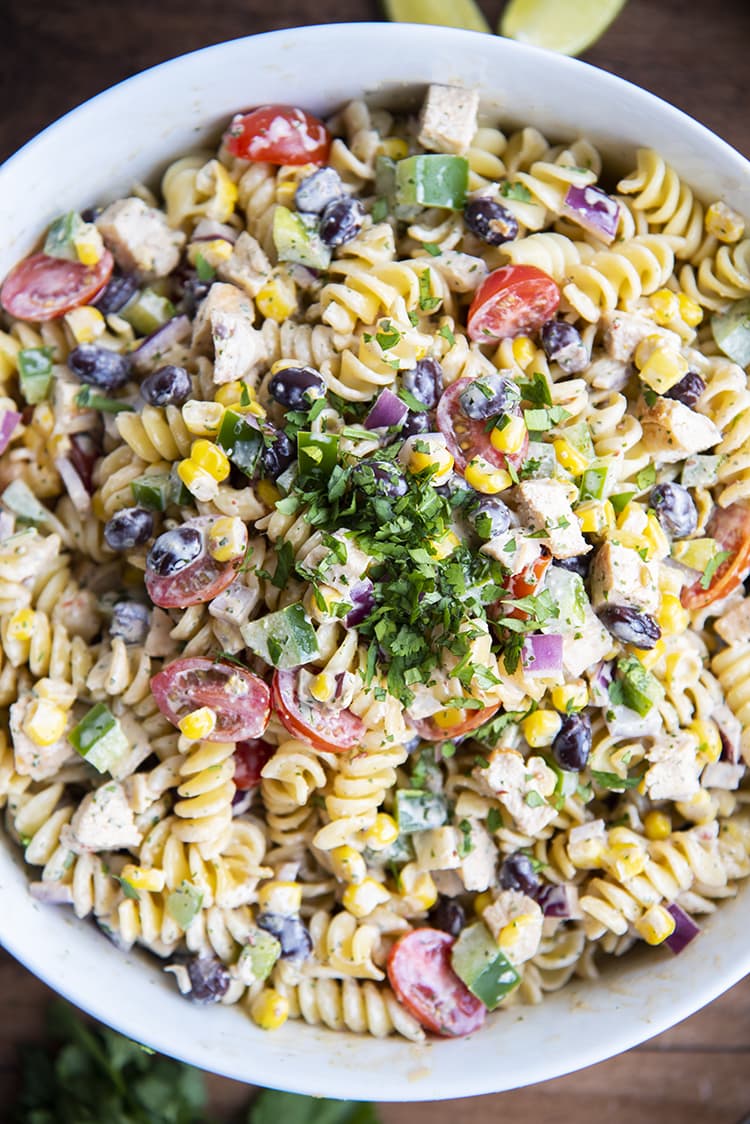 Pasta salad with chipotle ranch dressing, tomatoes, black beans, corn, and chicken shot from the top