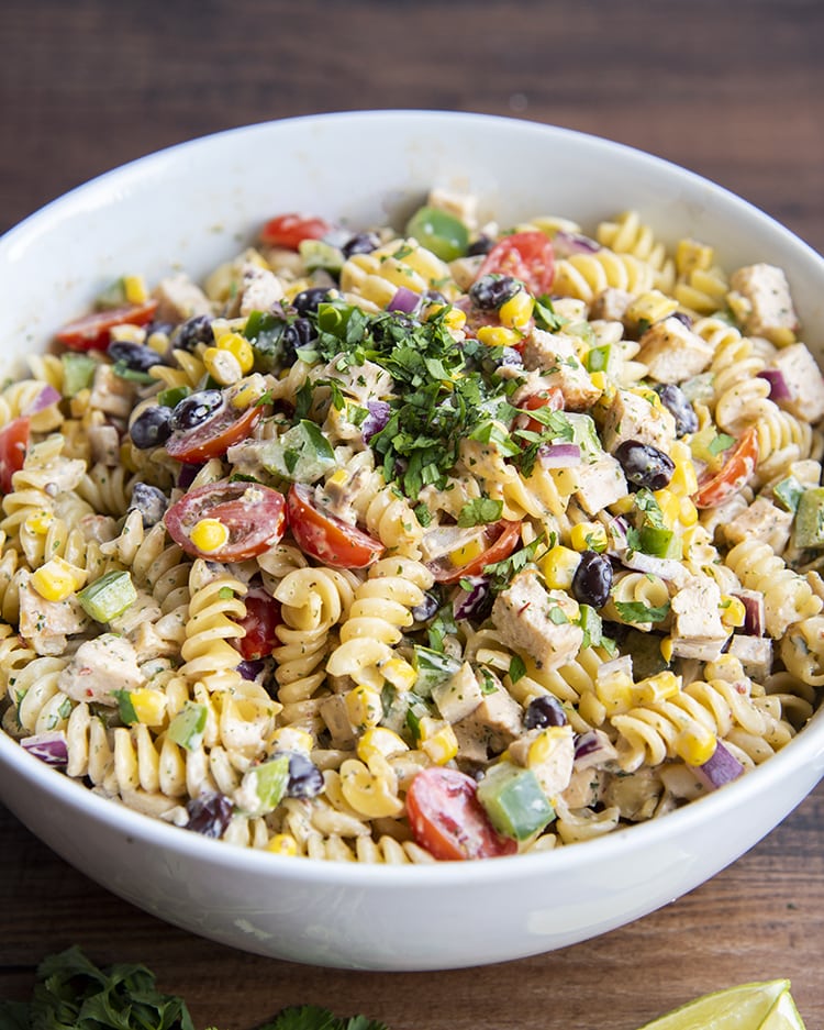 Close up of southwest pasta with pasta, chicken, vegetables and a chipotle ranch dressing