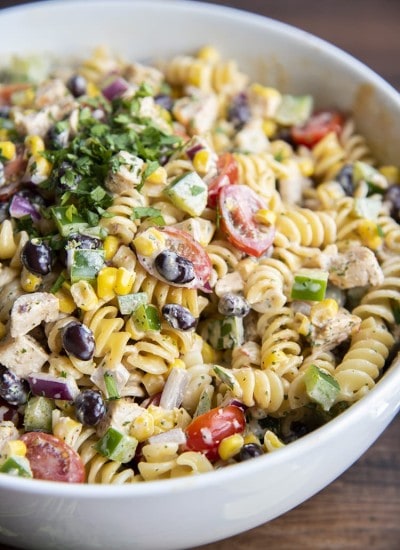 Close up of southwest pasta with pasta, chicken, vegetables and a chipotle ranch dressing